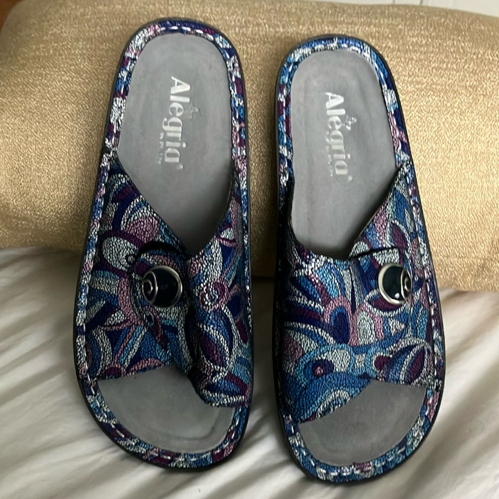 Alegria Blue and Purple Mules with Vibrant Pattern and Sturdy Sole